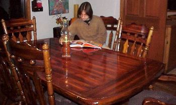 Jan enjoys her new dining room table, October 19, 1999.