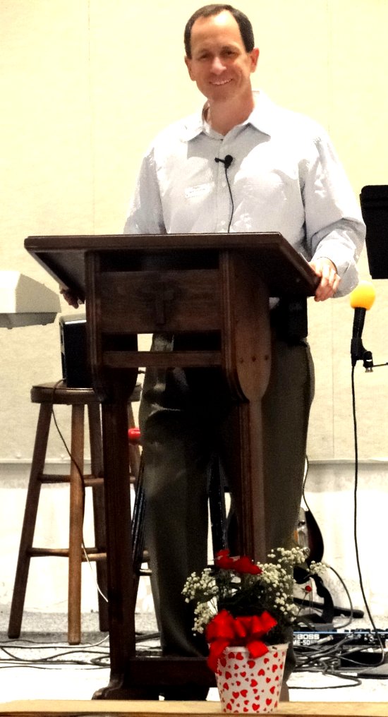 Pastor David preaching 
"Changing Water to Wine"  - 12/14/10